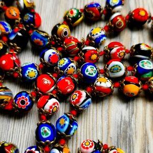 27' long strand antique Venetian Millefiori glass beads with gold clasp